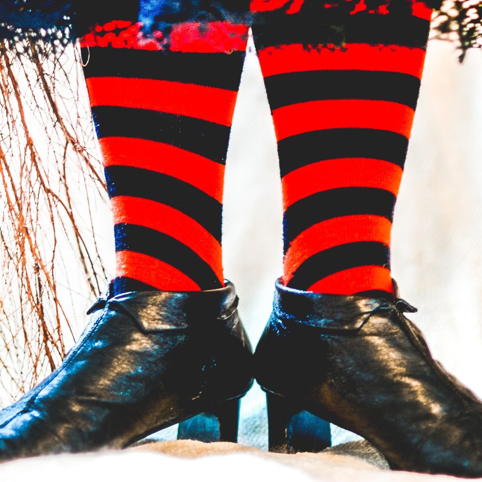 Image of black shoes and striped stockings